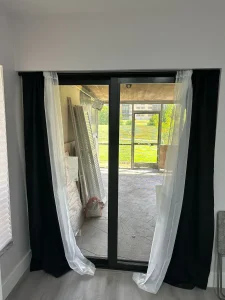 New black frame sliding glass door- NF Home Improvements